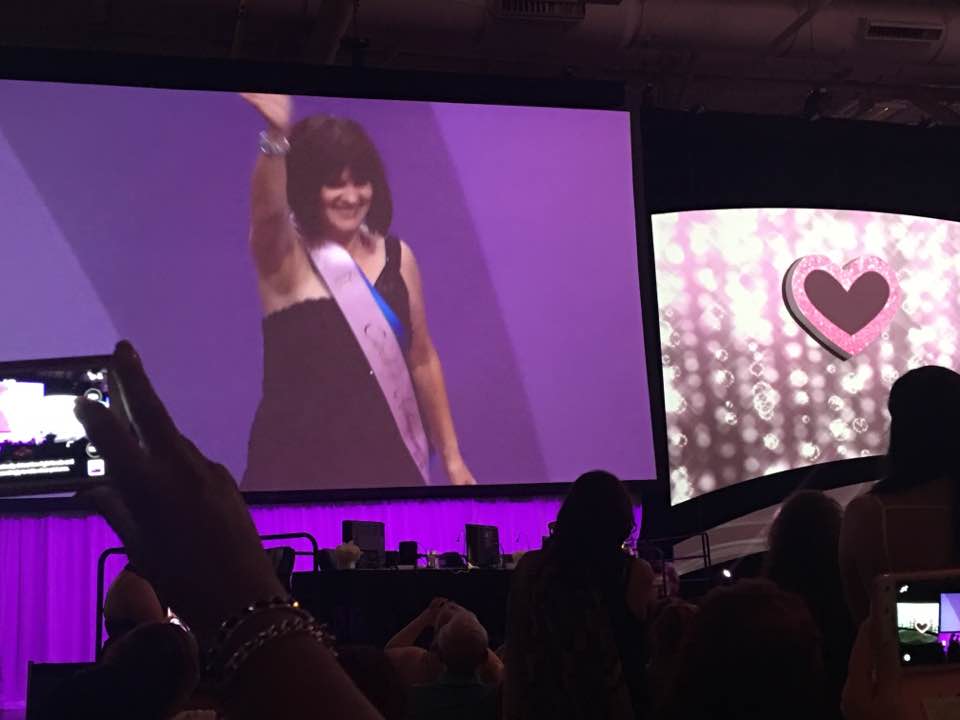 Kathy Laughlin on Mary Kay stage to celebrate success